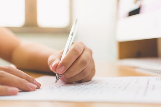 person signing document