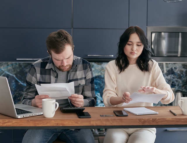 couple looking at paperwork