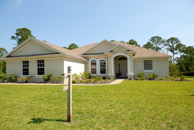one story home and lawn