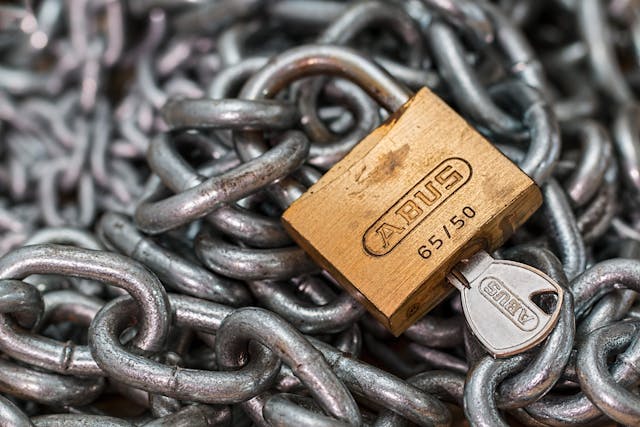 lock and chains in a pile